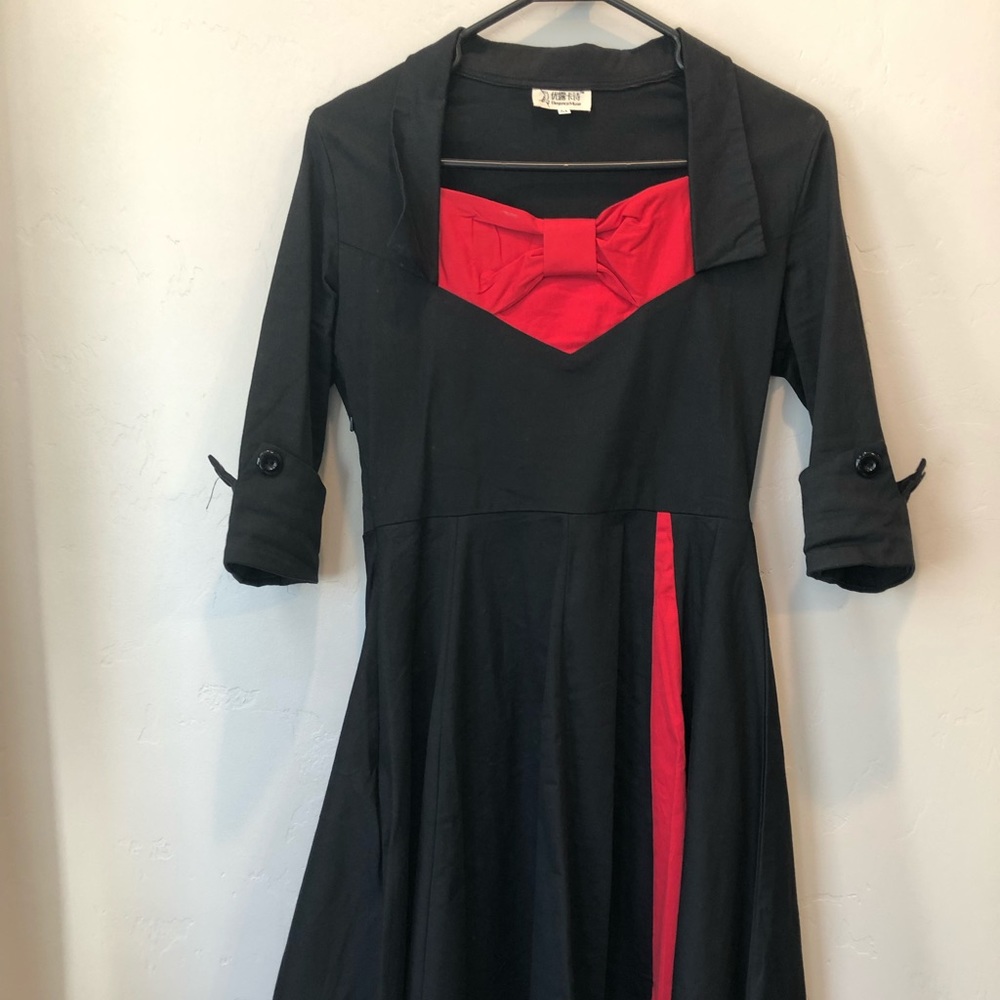 Gorgeous black dress with accents